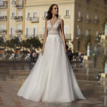2021 Нов дизайн на сватбени рокли в стил бохо с V образно деколте и аппликацией, сватбената рокля трапецовидна форма, плажни богемные булчинска рокля с отворен гръб